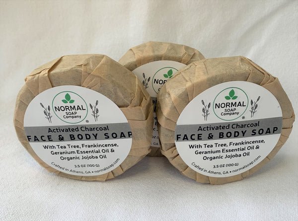 Activated Charcoal Face Soap featuring Tea Tree & Geranium Essential Oil; Camellia Seed and Organic Jojoba Oil