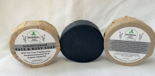 Activated Charcoal Face Soap featuring Tea Tree & Geranium Essential Oil; Camellia Seed and Organic Jojoba Oil